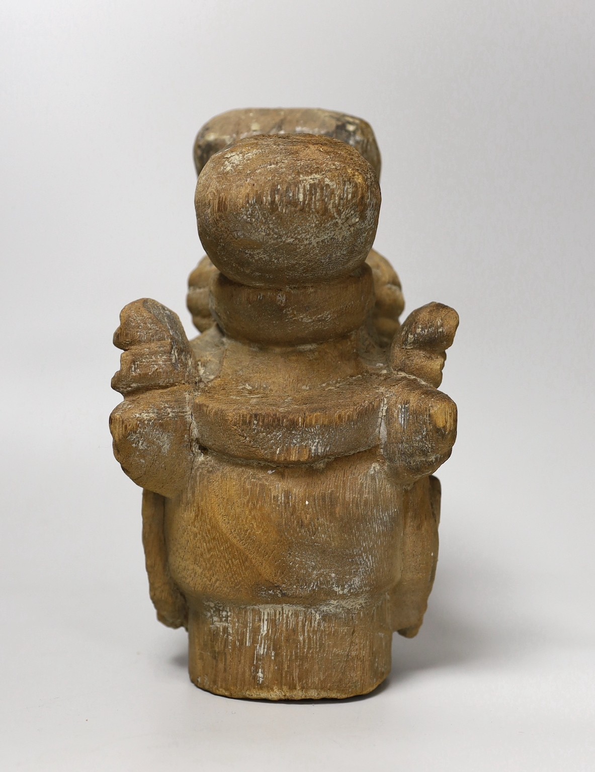 A Chinese Tang style wood head. 24cm high